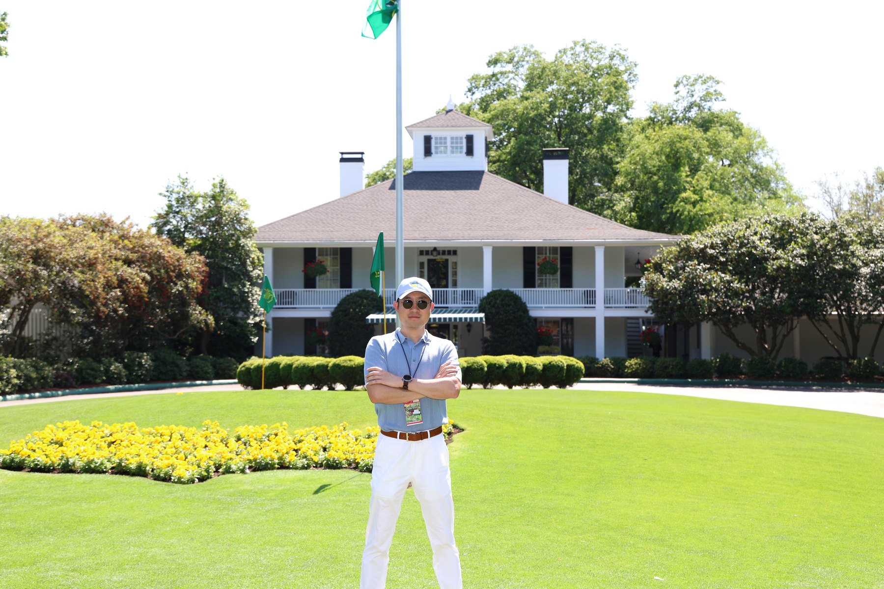 Standing on the lawn in front of the Augusta National clubhouse during Masters week, 2024.